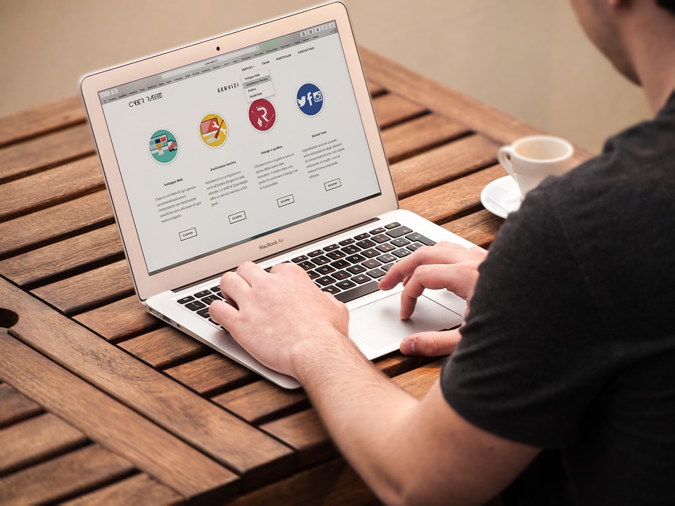man using laptop